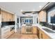 Modern kitchen features stainless appliances, wooden cabinets, stone countertops and an open design at 2201 Juniper Ct, Boulder, CO 80304