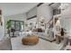 Spacious living room featuring an open layout, high ceilings, and modern design elements with seamless access to dining and kitchen at 2201 Juniper Ct, Boulder, CO 80304
