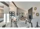 Inviting living room featuring vaulted ceilings, fireplace, and comfortable seating, perfect for relaxation and entertainment at 2201 Juniper Ct, Boulder, CO 80304