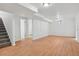 The finished basement features bright walls, and vinyl flooring, offering a versatile living area at 7180 Zuni St, Denver, CO 80221