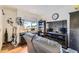 Functional home office with desk, shelving, and comfortable seating at 5757 S Algonquian Way # E, Aurora, CO 80016