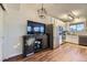 Spacious kitchen area with modern appliances, decorative elements, and a convenient layout at 5757 S Algonquian Way # E, Aurora, CO 80016