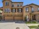Townhome exterior showing the garage and entry way at 10578 Parkington Ln # 35D, Highlands Ranch, CO 80126