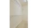 Walk-in closet with custom shelving at 10578 Parkington Ln # 35D, Highlands Ranch, CO 80126