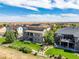 Aerial view of house and surrounding homes at 7609 S Country Club Pkwy, Aurora, CO 80016