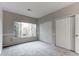 Bedroom features large closets and a window allowing ample natural light at 8416 Pebble Creek Way # 203, Highlands Ranch, CO 80126