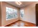 Inviting dining area with large windows offering natural light at 8416 Pebble Creek Way # 203, Highlands Ranch, CO 80126