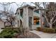 Charming condo featuring a two-story layout, private entry, and well-kept landscaping at 8416 Pebble Creek Way # 203, Highlands Ranch, CO 80126