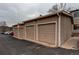 Ample parking provided with row of garages with multiple car spaces available at 8416 Pebble Creek Way # 203, Highlands Ranch, CO 80126