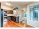 Well-lit kitchen with stainless steel appliances and elegant countertops at 8416 Pebble Creek Way # 203, Highlands Ranch, CO 80126