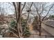 View of playground and other buildings with fall trees from porch at 8416 Pebble Creek Way # 203, Highlands Ranch, CO 80126