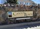 Stone sign for Canyon Ranch community on stone wall, enhancing the entrance at 8416 Pebble Creek Way # 203, Highlands Ranch, CO 80126