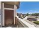 Private balcony offers views of parking and surrounding neighborhood, and includes exterior storage closet at 14251 E 1St Dr # 305, Aurora, CO 80011