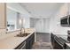 Bright kitchen featuring white countertops, a stainless steel sink, and modern appliances at 14251 E 1St Dr # 305, Aurora, CO 80011