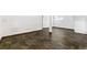 Finished basement area with tile flooring at 8539 W Duquesne Dr, Lakewood, CO 80227