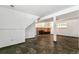 Finished basement area with a fireplace, tile flooring, and natural light at 8539 W Duquesne Dr, Lakewood, CO 80227