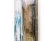 Bathroom showing a stand-up shower with designer tile at 8539 W Duquesne Dr, Lakewood, CO 80227