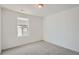 Carpeted bedroom with ample light from a window at 10968 Snowdon St, Parker, CO 80134
