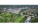 Aerial view of the neighborhood, showing the surrounding area and golf course at 106 S University Blvd # 5, Denver, CO 80209