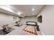 Basement with home gym and daybed at 106 S University Blvd # 5, Denver, CO 80209