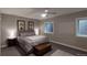 Basement bedroom with a queen bed and nightstand at 106 S University Blvd # 5, Denver, CO 80209