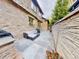 Relaxing patio space with modern outdoor seating, brick accents, and a stone wall at 106 S University Blvd # 5, Denver, CO 80209