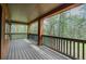 View of the balcony and wooded surrounding at 7597 Molas Ct, Larkspur, CO 80118