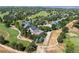 An aerial view of a house next to a golf course at 2975 Thunder Lake Cir, Lafayette, CO 80026