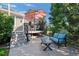 Spacious backyard patio with seating area, umbrella, and deck at 2975 Thunder Lake Cir, Lafayette, CO 80026