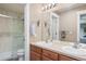 Clean bathroom with double vanity, shower, and toilet at 2975 Thunder Lake Cir, Lafayette, CO 80026