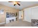 Bedroom with built-in shelving, closet, and adjoining room access at 2975 Thunder Lake Cir, Lafayette, CO 80026