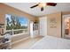 Bedroom with a large window offering scenic views and built-in shelving at 2975 Thunder Lake Cir, Lafayette, CO 80026