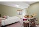 Basement bedroom with drum set and single bed at 2975 Thunder Lake Cir, Lafayette, CO 80026