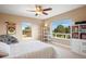 Spacious bedroom with large windows, ceiling fan, and ample closet space at 2975 Thunder Lake Cir, Lafayette, CO 80026