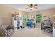 Bedroom featuring a workspace, large windows, and ample storage at 2975 Thunder Lake Cir, Lafayette, CO 80026