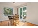 Breakfast nook with hardwood floors and sliding door to patio access at 2975 Thunder Lake Cir, Lafayette, CO 80026