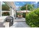 Back deck with seating area, grill, and umbrella at 2975 Thunder Lake Cir, Lafayette, CO 80026