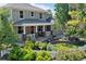 Two-story house with a red front door and landscaped yard at 2975 Thunder Lake Cir, Lafayette, CO 80026