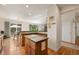 Kitchen with island, granite countertops, and wood cabinets at 2975 Thunder Lake Cir, Lafayette, CO 80026