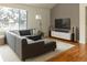 Living room with sectional sofa and home theater system at 2975 Thunder Lake Cir, Lafayette, CO 80026