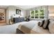 Relaxing bedroom featuring a view to the outside at 2400 E Cherry Creek South Dr # 307, Denver, CO 80209