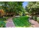 Lush green common area with comfortable seating, perfect for relaxation and outdoor gatherings at 2400 E Cherry Creek South Dr # 307, Denver, CO 80209