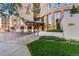 Attractive condominium entrance with manicured landscaping and a covered entryway for added curb appeal at 2400 E Cherry Creek South Dr # 307, Denver, CO 80209