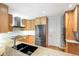 Charming kitchen with stainless steel appliances, hardwood floors and granite countertops at 2400 E Cherry Creek South Dr # 307, Denver, CO 80209