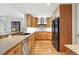 Charming kitchen featuring granite countertops, mosaic backsplash and stainless steel appliances at 2400 E Cherry Creek South Dr # 307, Denver, CO 80209
