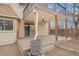 Covered deck with ceiling fan and rain barrel at 4795 S Yank Way, Morrison, CO 80465