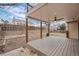 Covered patio with deck and backyard view at 4795 S Yank Way, Morrison, CO 80465