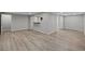 Bright, open basement with wood-look flooring and ample space at 4795 S Yank Way, Morrison, CO 80465