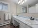 Double vanity bathroom with marble countertop at 4795 S Yank Way, Morrison, CO 80465