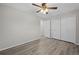 Bright bedroom with ceiling fan and large closet at 4795 S Yank Way, Morrison, CO 80465